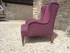 Antique low wing chair by Howard and Sons2.jpg